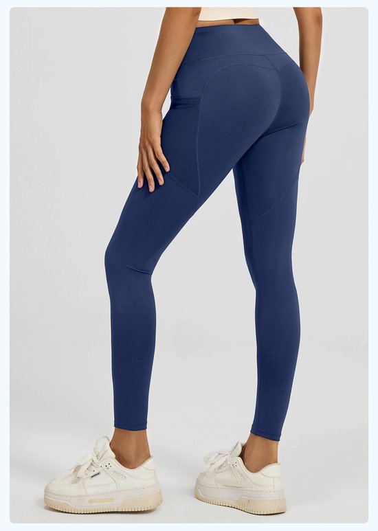 Navy blue leggings worn by a person on a white background