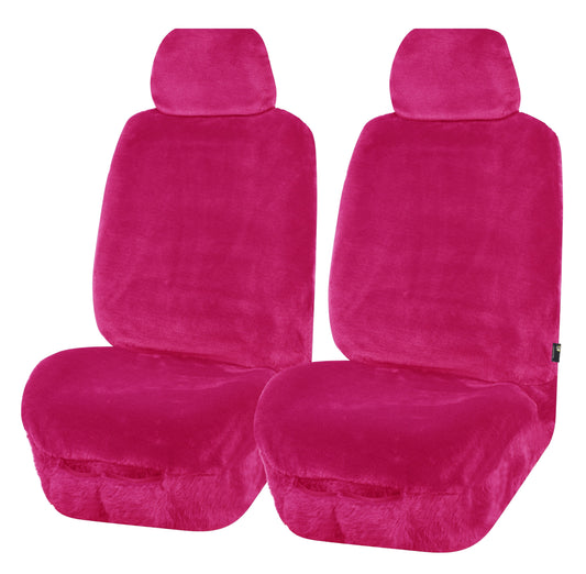 Set of pink car seat covers on a white background