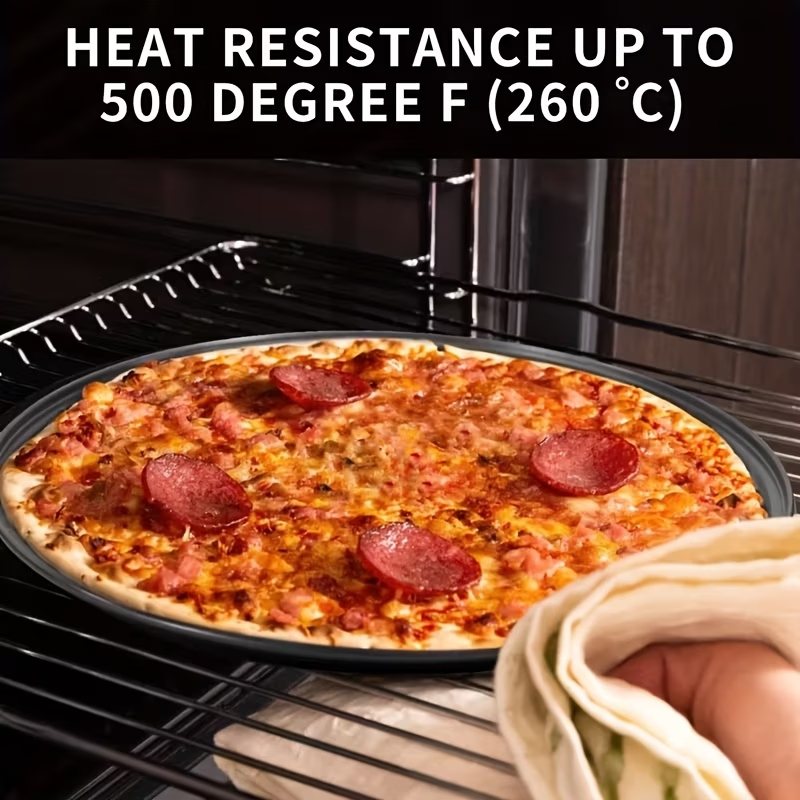 Two pizza baking pans, each 30.48 cm in diameter, feature ventilation holes for improved cooking efficiency and a non-stick coating, making them ideal for oven use.