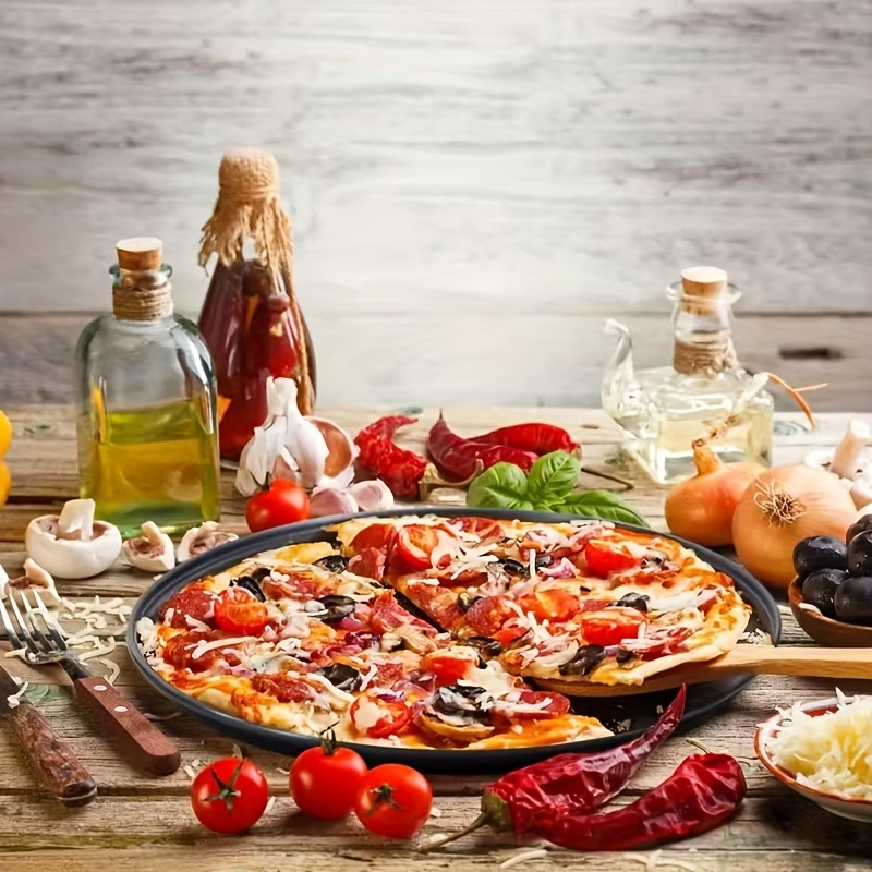 Two pizza baking pans, each 30.48 cm in diameter, feature ventilation holes for improved cooking efficiency and a non-stick coating, making them ideal for oven use.