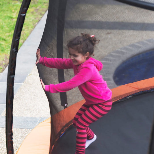 Kid Playing in Replacement Trampoline Net – Kahuna 12ft 8 Pole Net for Safety - Oz Online Deals