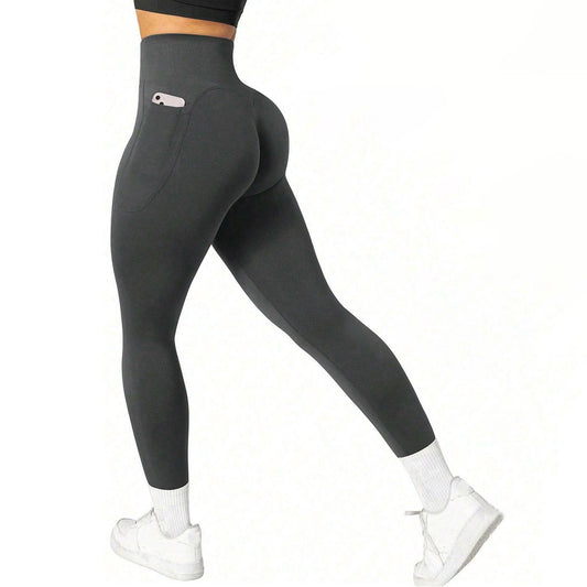 Dark gray leggings with a pocket on a white background