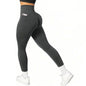 Dark gray leggings with a pocket on a white background