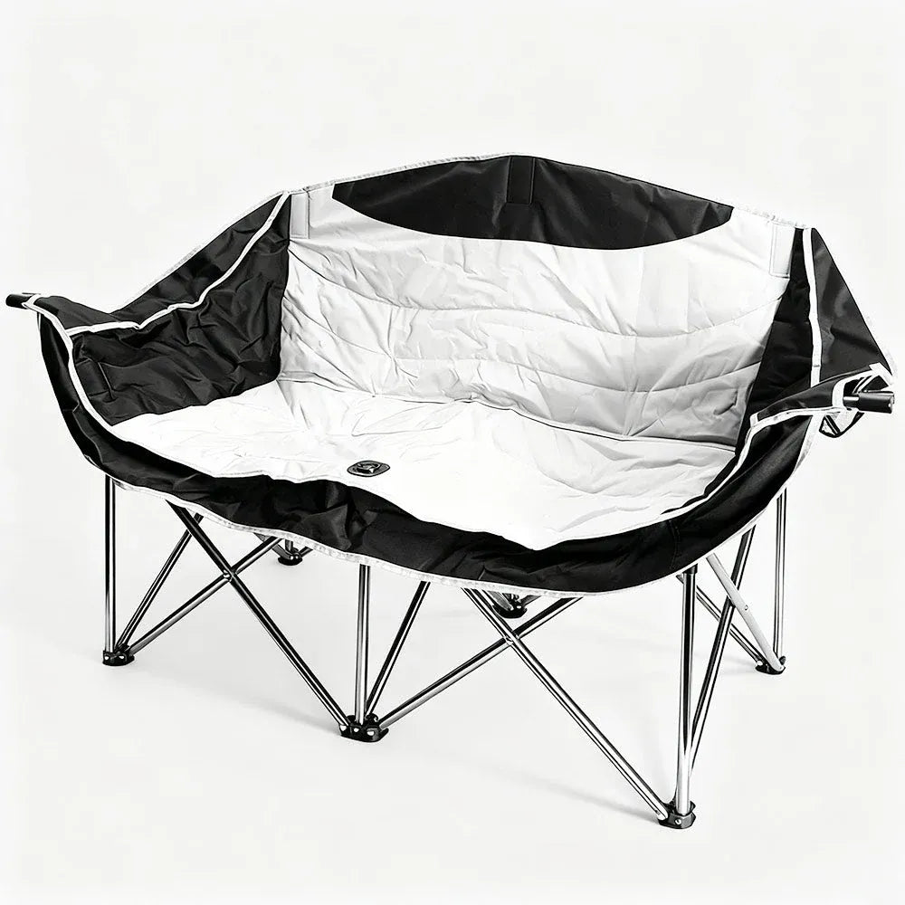 Black and white folding chair on a white background