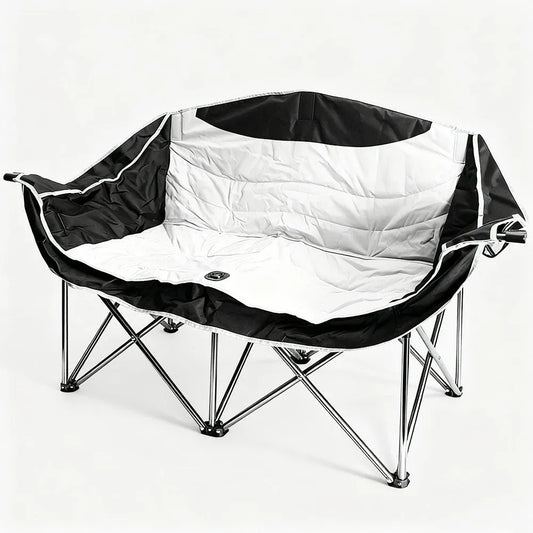 Black and white folding chair on a white background