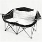Black and white folding chair on a white background
