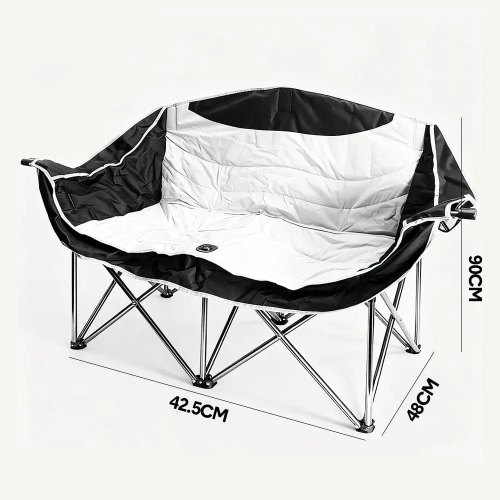 Black and white folding chair with dimensions on a white background